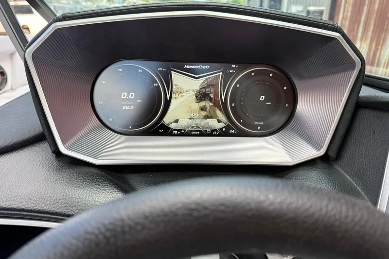 Slide: The Image of Dashboard of a 2019 MasterCraft X22 boat with digital display and controls. - 8