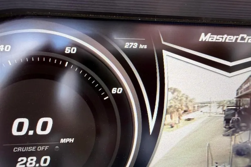 Slide: The Image of Dashboard of a 2019 MasterCraft X22 boat showing 273 hours and 0.0 MPH. - 9