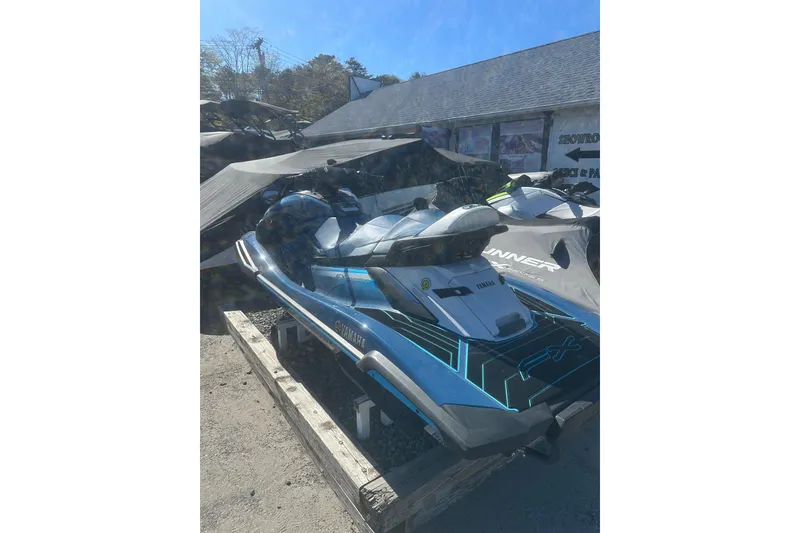 Slide: The Image of 2024 Yamaha WaveRunner FX Cruiser HO in a showroom, showcasing sleek design and modern features. - 8