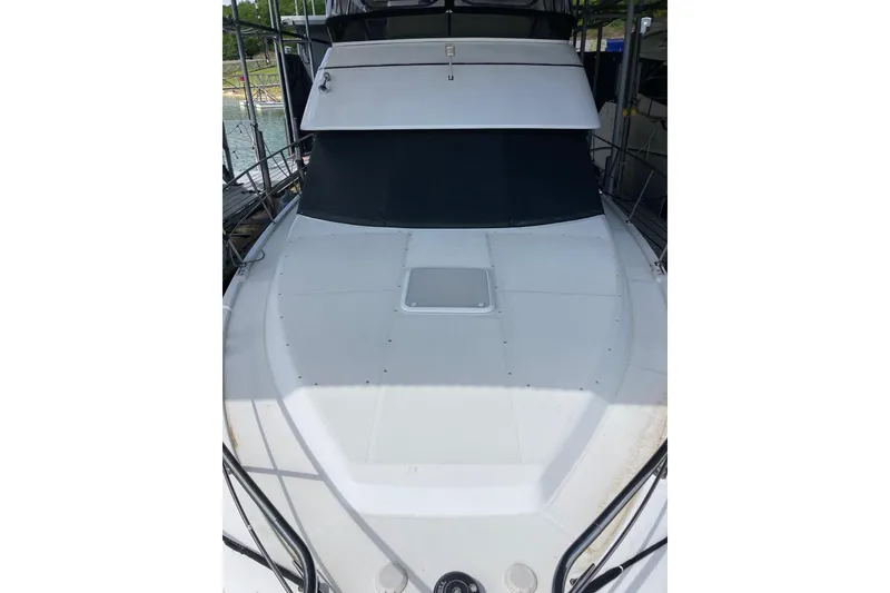 Slide: The Image of 2001 Carver 356 Motor Yacht, white deck view, docked at marina. - 3