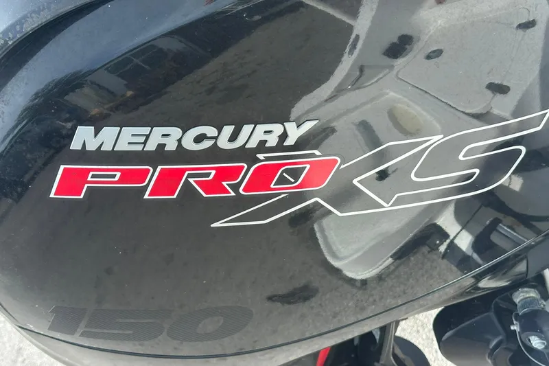 Slide: The Image of Mercury Pro XS 150 engine on a 2021 Tahoe 2150 boat. - 22