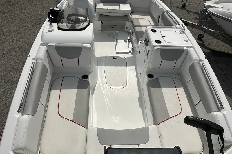 Slide: The Image of 2021 Tahoe 2150 boat interior with spacious seating and modern design. - 25