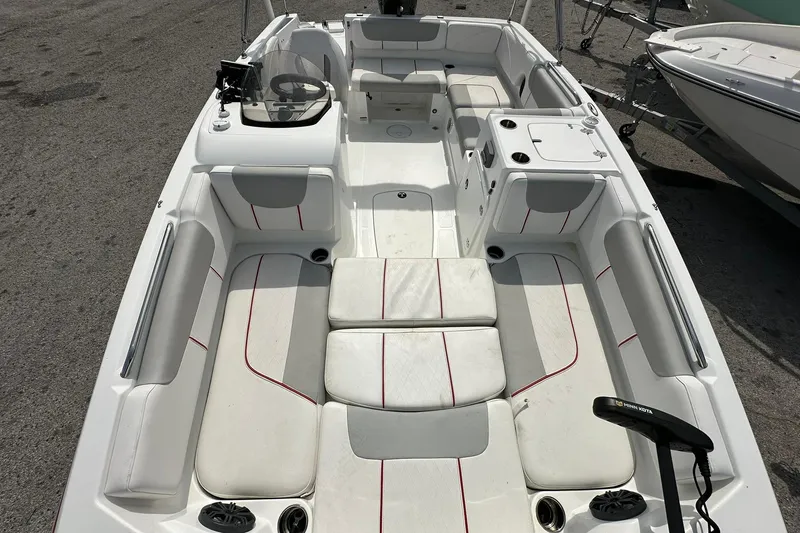 Slide: The Image of 2021 Tahoe 2150 boat interior with spacious seating and modern design. - 6