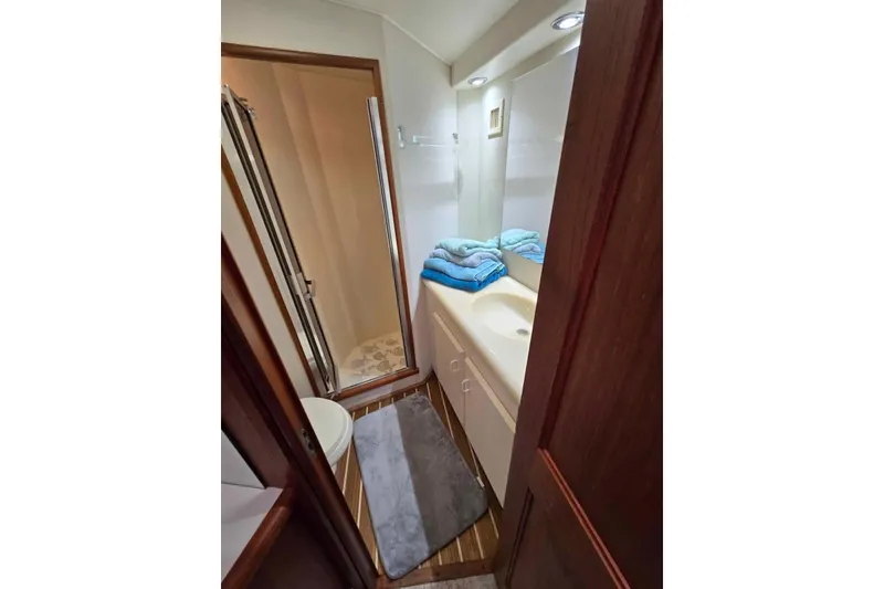 Slide: The Image of Bathroom interior of 1990 Viking 53 Convertible yacht with shower and sink. - 45