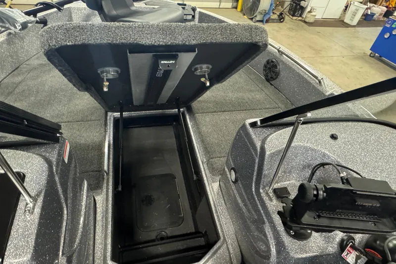Slide: The Image of Interior view of 2026 Nitro ZV19 Sport Pro boat, showcasing storage compartment and seating area. - 13