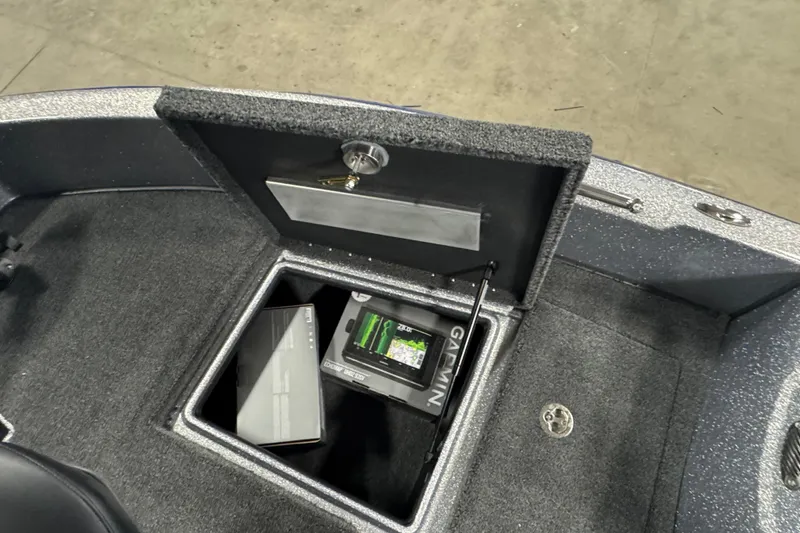 Slide: The Image of Storage compartment of 2026 Nitro ZV19 Sport Pro boat with Garmin electronics. - 17