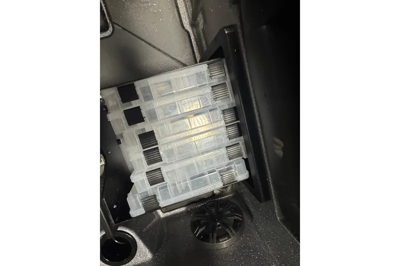 Slide: The Image of Storage compartment with clear tackle boxes in a 2026 Nitro ZV19 Sport Pro boat. - 22