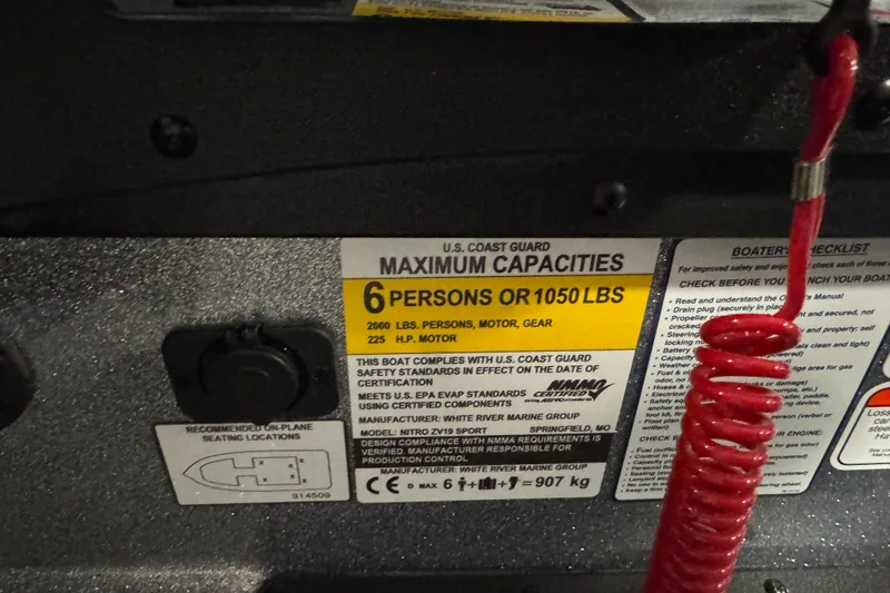 Slide: The Image of 2026 Nitro ZV19 Sport Pro capacity label, 6 persons or 1050 lbs, 225 HP motor. - 8