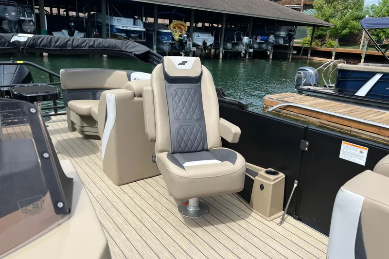 Slide: The Image of Luxurious seating on 2026 Starcraft SLS 3 R boat, docked at marina. - 14