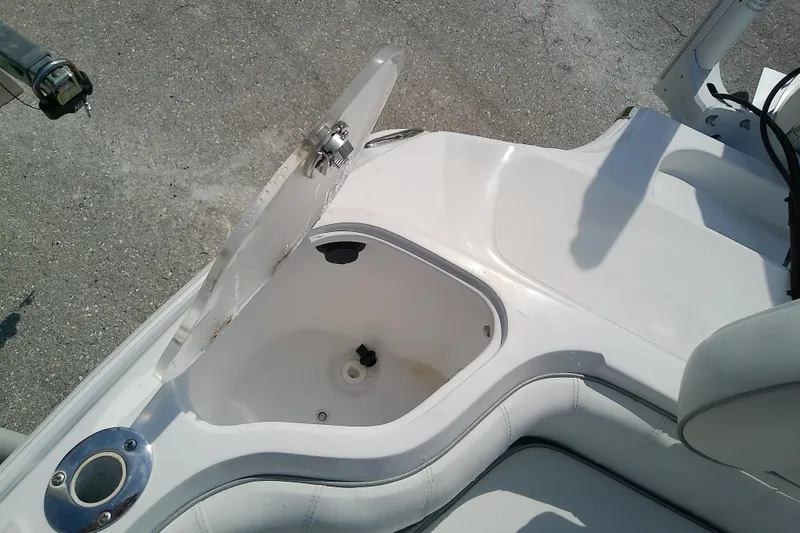 Slide: The Image of Open storage compartment on 2022 Glasstream 280 Pro-XS boat deck. - 18