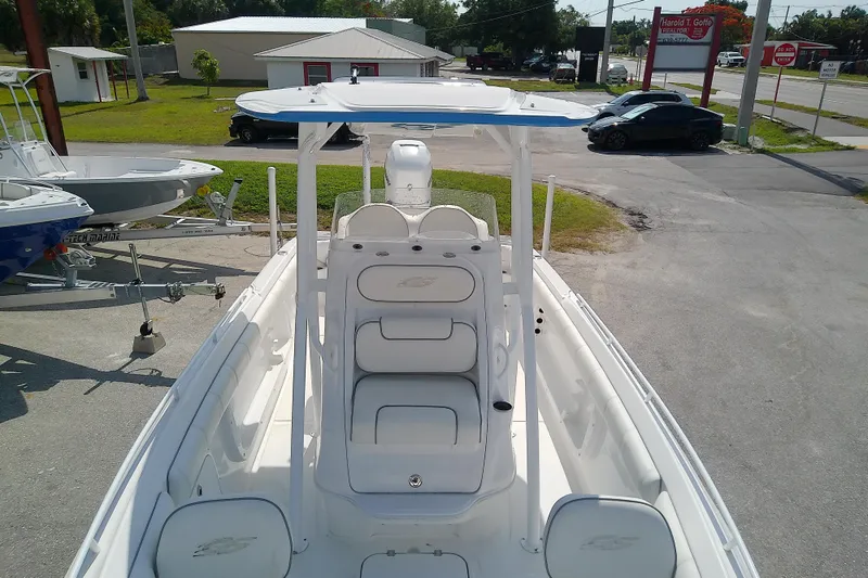 Slide: The Image of 2022 Glasstream 280 Pro-XS boat with T-top, parked on a trailer in a lot. - 19