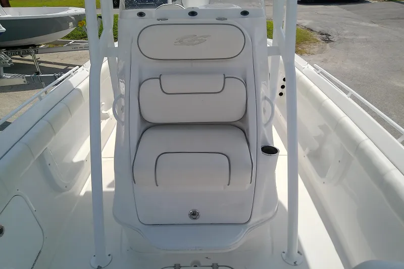 Slide: The Image of 2022 Glasstream 280 Pro-XS boat interior with white seating and console. - 24