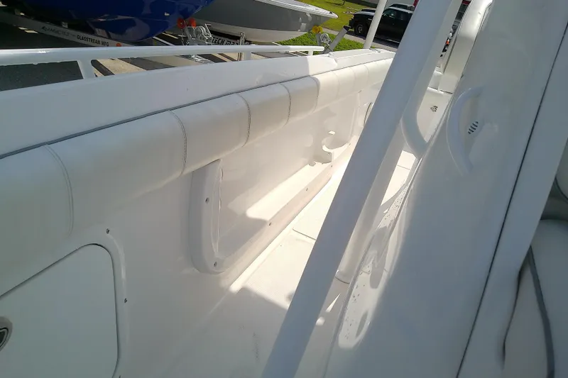 Slide: The Image of 2022 Glasstream 280 Pro-XS boat interior with white seating and sleek design. - 26