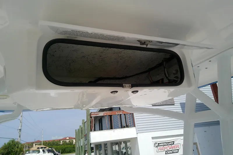 Slide: The Image of 2022 Glasstream 280 Pro-XS boat compartment, open hatch view. - 38