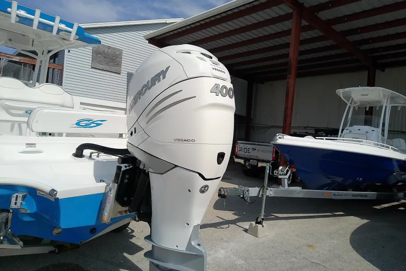Slide: The Image of 2022 Glasstream 280 Pro-XS boat with Mercury 400 Verado engine in a marina setting. - 7