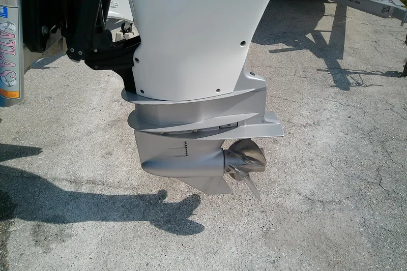 Slide: The Image of Outboard motor of 2022 Glasstream 280 Pro-XS boat on concrete surface. - 8