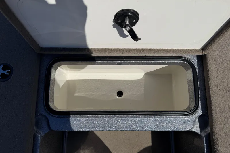 Slide: The Image of Open storage compartment in a 2009 Ranger 188 VX boat. - 14