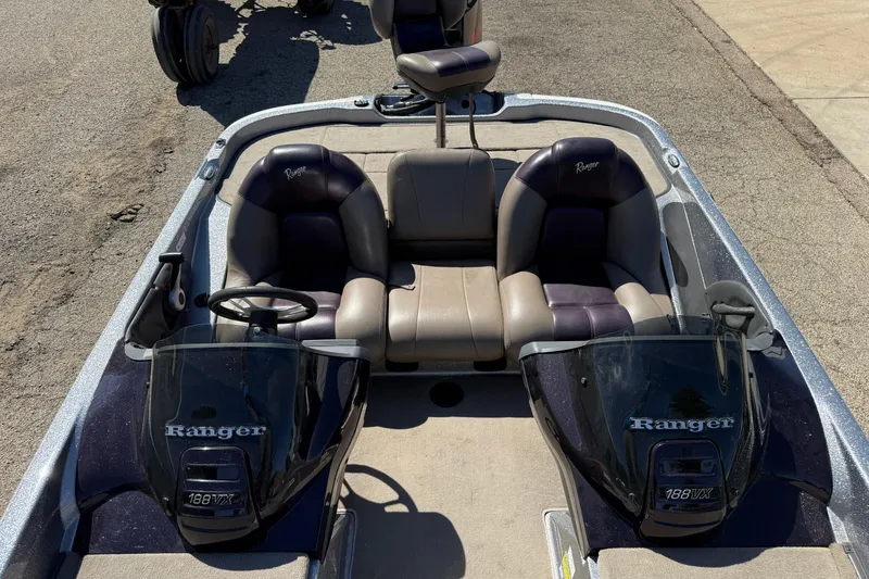 Slide: The Image of 2009 Ranger 188 VX boat interior with dual consoles and seating. - 16