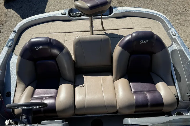Slide: The Image of 2009 Ranger 188 VX boat interior with dual seats and steering wheel. - 17