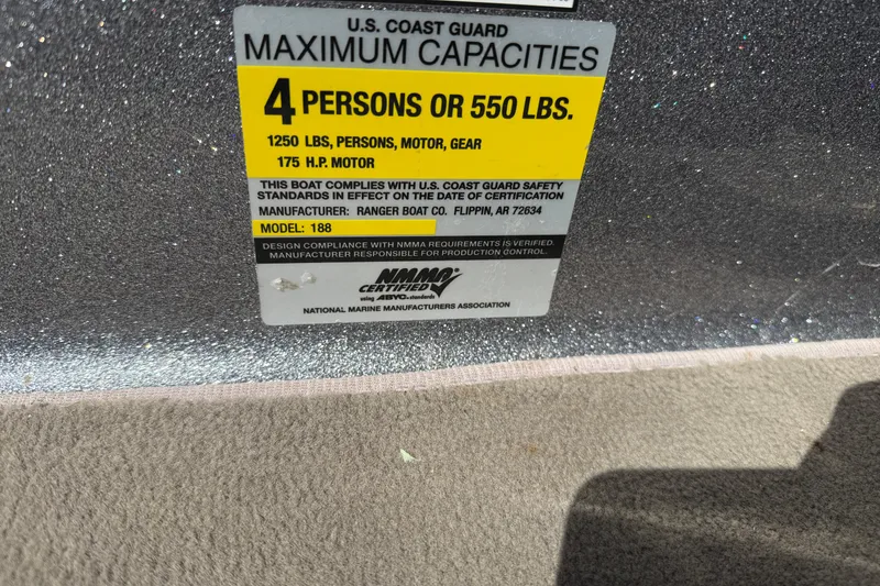 Slide: The Image of 2009 Ranger 188 VX boat capacity label, 4 persons or 550 lbs, 175 HP motor. - 31