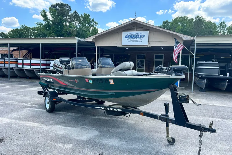 Slide: The Image of 1996 Tracker Tournament V-17 boat on trailer at Berkeley Outdoors dealership. - 5
