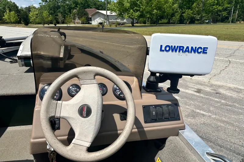 Slide: The Image of 1996 Tracker Tournament V-17 boat dashboard with Lowrance Elite fish finder. - 7