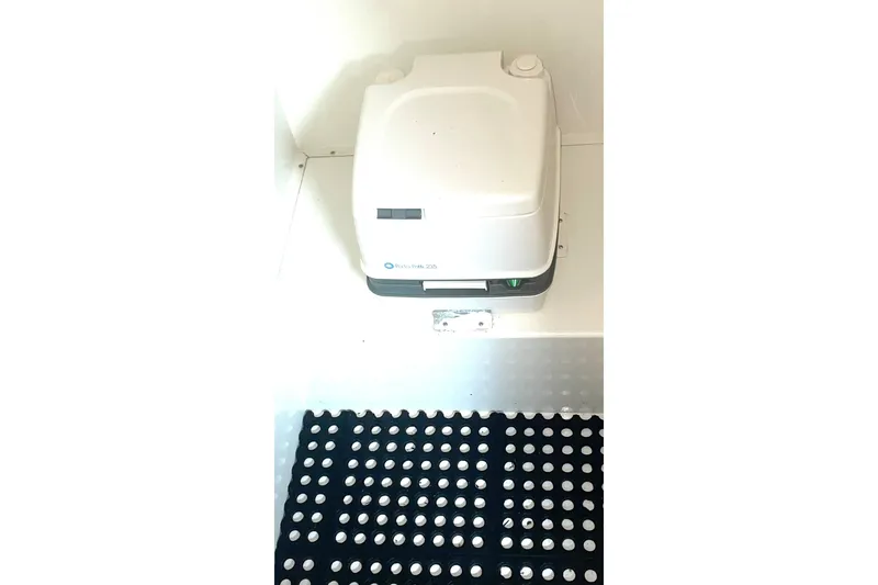 Slide: The Image of Portable toilet in a compact space, Lifetimer model 3540, year 2005. - 13