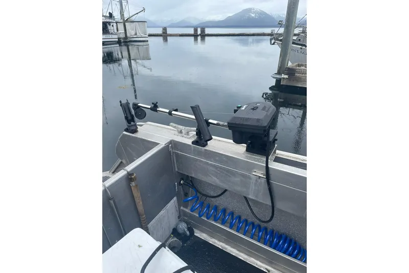 Slide: The Image of Fishing boat with Lifetimer 3540 equipment, docked in a serene harbor, 2005 model. - 21