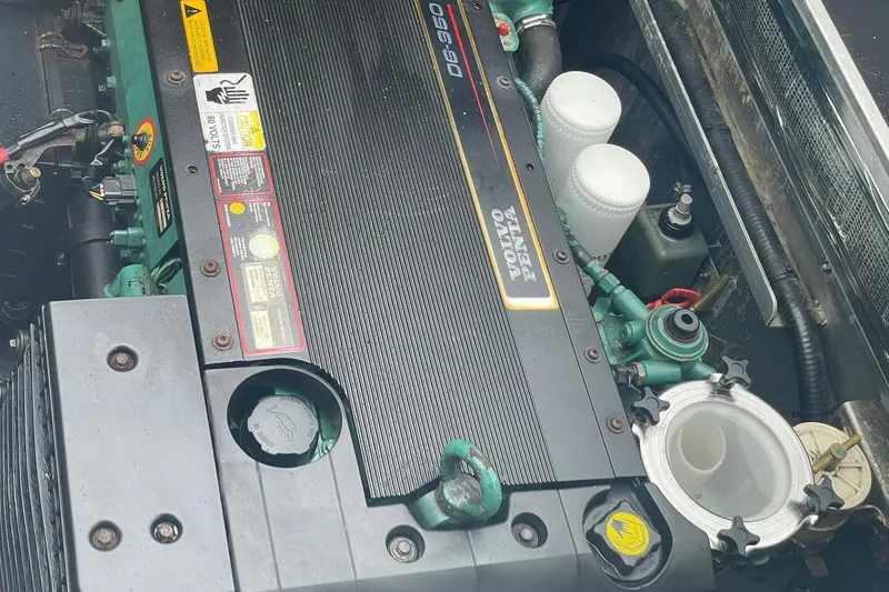 Slide: The Image of Engine compartment of a 2005 Lifetimer 3540, featuring a Volvo Penta motor. - 26