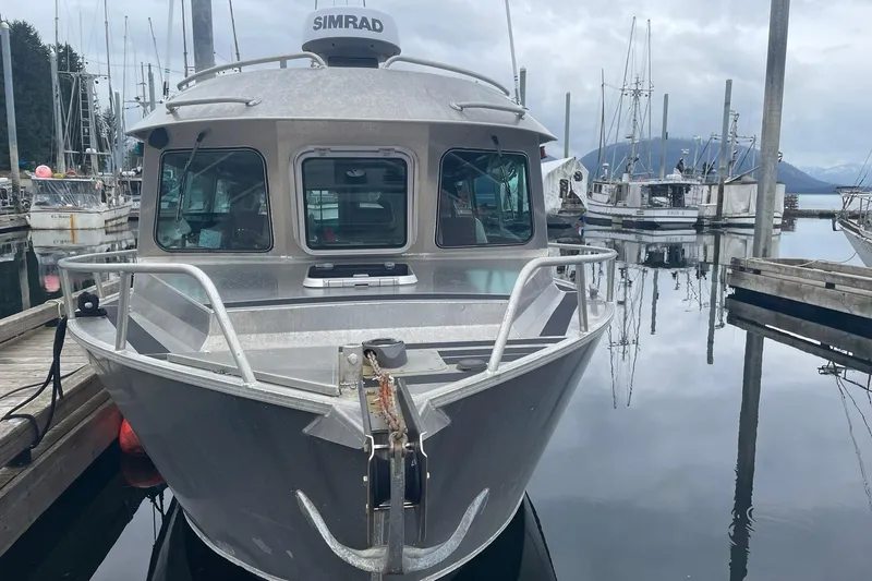 Slide: The Image of Aluminum Lifetimer 3540 boat docked at marina, overcast sky, 2005 model. - 27