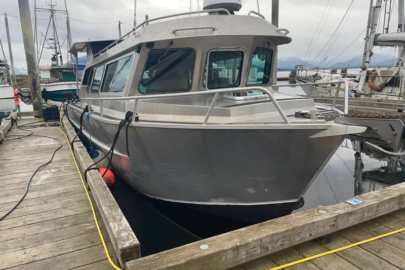 Slide: The Image of Aluminum Lifetimer 3540 boat docked at marina, 2005 model. - 28