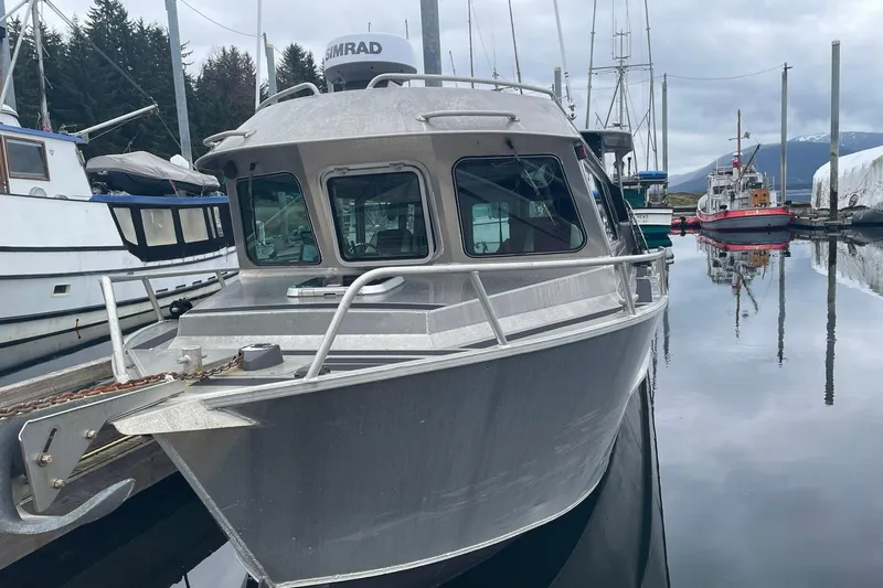 Slide: The Image of Aluminum Lifetimer 3540 boat docked in a marina, 2005 model. - 30