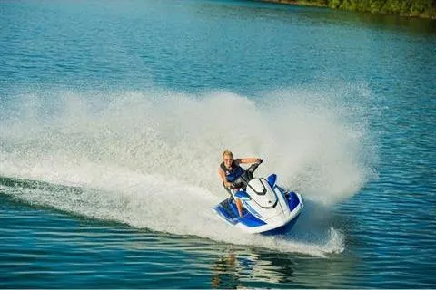 Slide: The Image of 2021 Yamaha WaveRunner FX Cruiser HO speeding on a clear blue lake. - 12