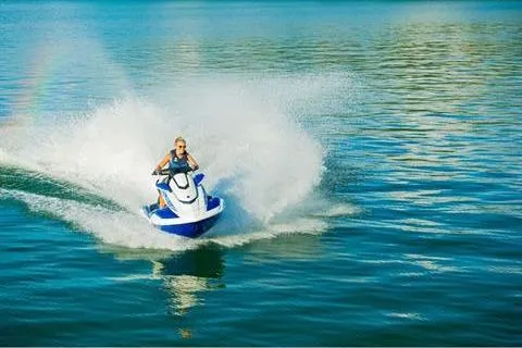 Slide: The Image of 2021 Yamaha WaveRunner FX Cruiser HO speeding on open water. - 13