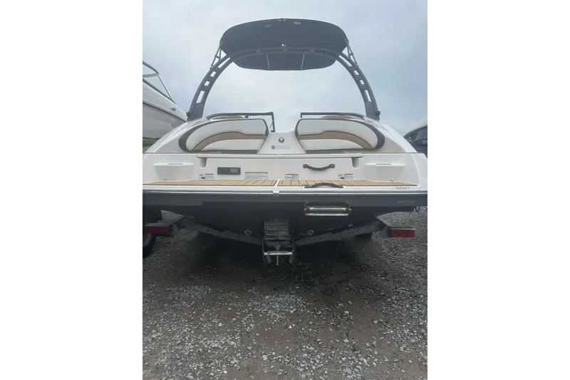 Slide: The Image of 2021 Yamaha Boats 195S rear view, showcasing swim platform and seating. - 5