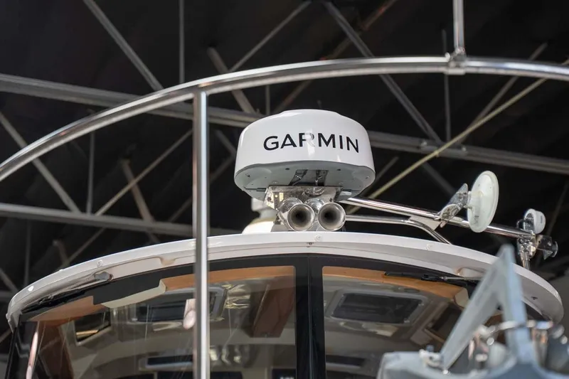 Slide: The Image of Garmin radar on 2025 Ranger Tugs R-25 boat, showcasing advanced navigation technology. - 8