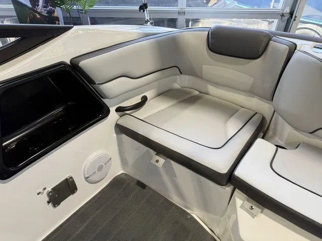 Slide: The Image of Interior of Yamaha SX190 boat, 2026 model, featuring sleek white seating. - 8