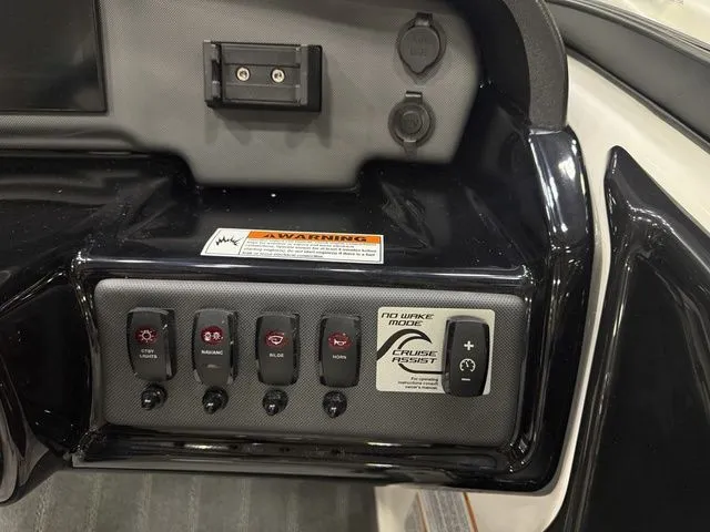 Slide: The Image of Dashboard of Yamaha Boats AR190 2026 with control buttons. - 14