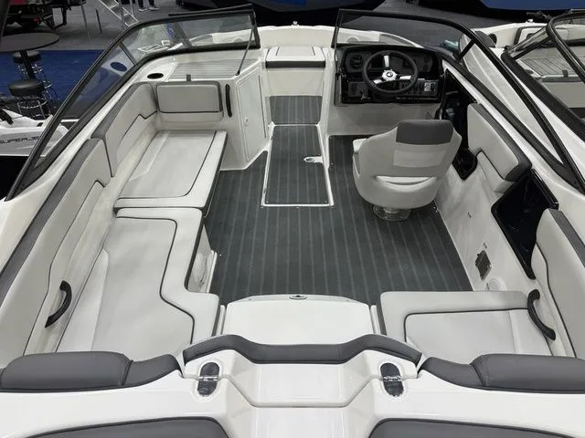 Slide: The Image of Interior of 2026 Yamaha AR190 boat with gray seating and steering wheel. - 4