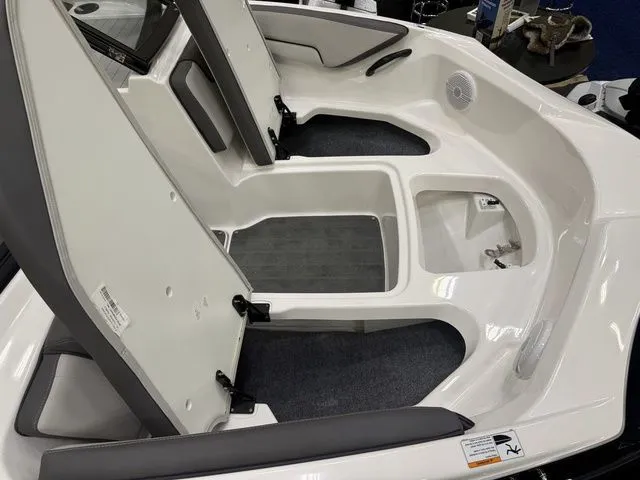 Slide: The Image of Interior of 2026 Yamaha Boats AR190 featuring seating and storage. - 17