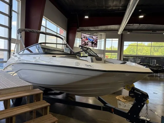Slide: The Image of 2026 Yamaha SX190 boat displayed in a showroom. - 3