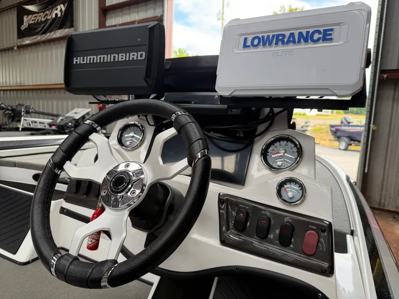 Slide: The Image of 2024 Nitro Z18 Pro boat console with Humminbird and Lowrance devices. - 12