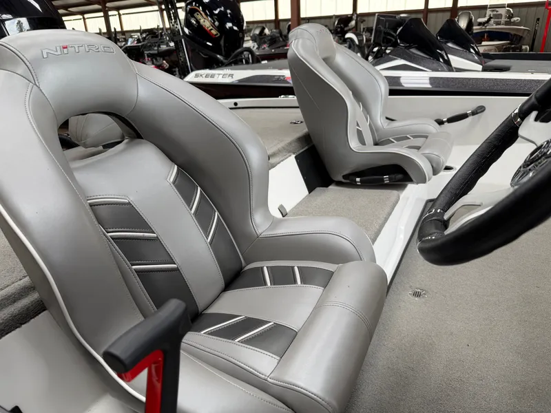 Slide: The Image of Interior of 2024 Nitro Z18 Pro with gray leather seats. - 14