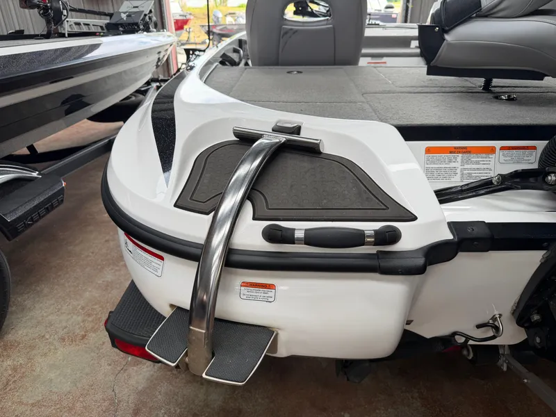 Slide: The Image of 2024 Nitro Z18 Pro boat stern with stainless steel handle. - 18