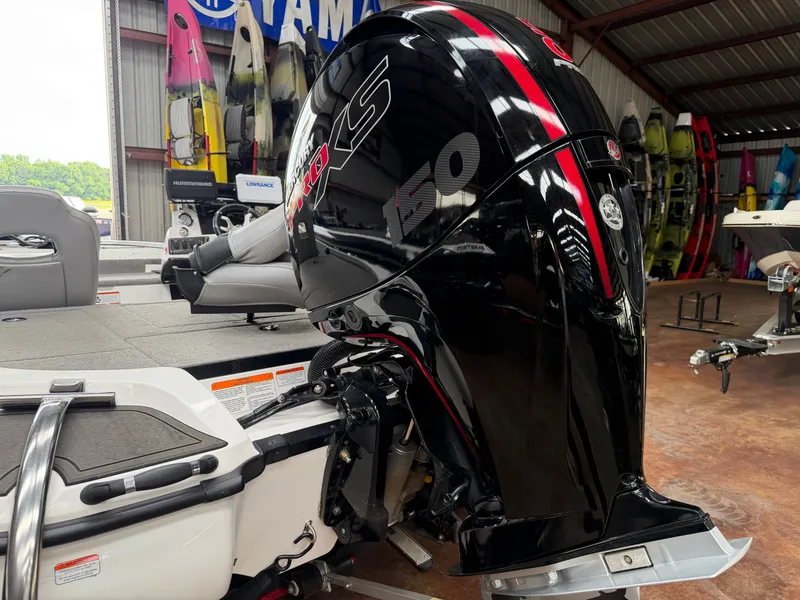 Slide: The Image of 2024 Nitro Z18 Pro boat with powerful outboard motor. - 19