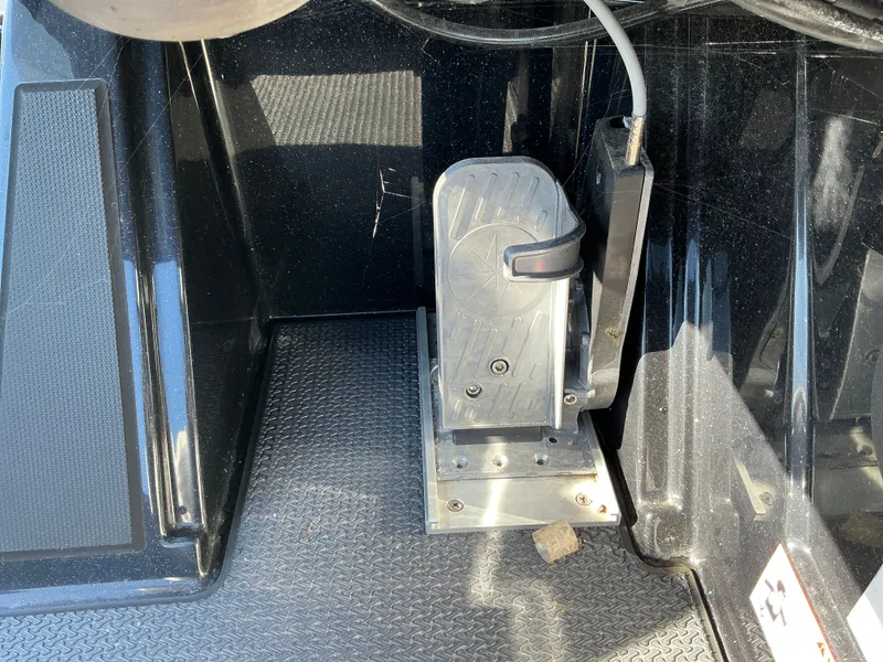 Slide: The Image of 2024 Ranger Z520R boat pedal on textured flooring. - 19