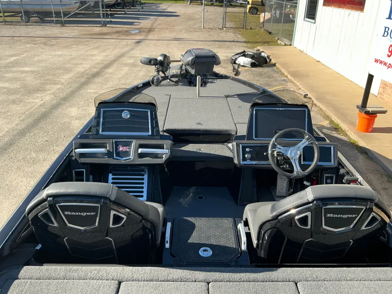 Slide: The Image of Interior view of 2024 Ranger Z520R boat with modern features. - 24