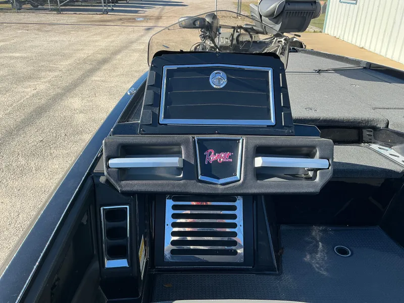 Slide: The Image of 2024 Ranger Z520R boat console with controls and logo. - 27