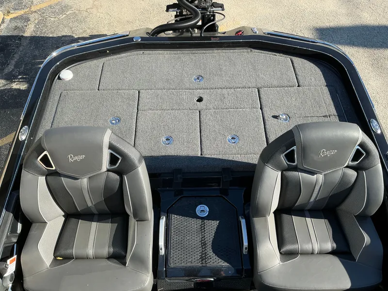 Slide: The Image of Interior of 2024 Ranger Z520R with gray seats and carpeted deck. - 41