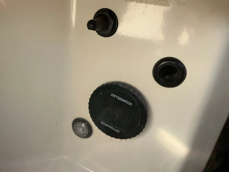 Slide: The Image of Close-up of controls in Ranger Z520R 2024 boat. - 46